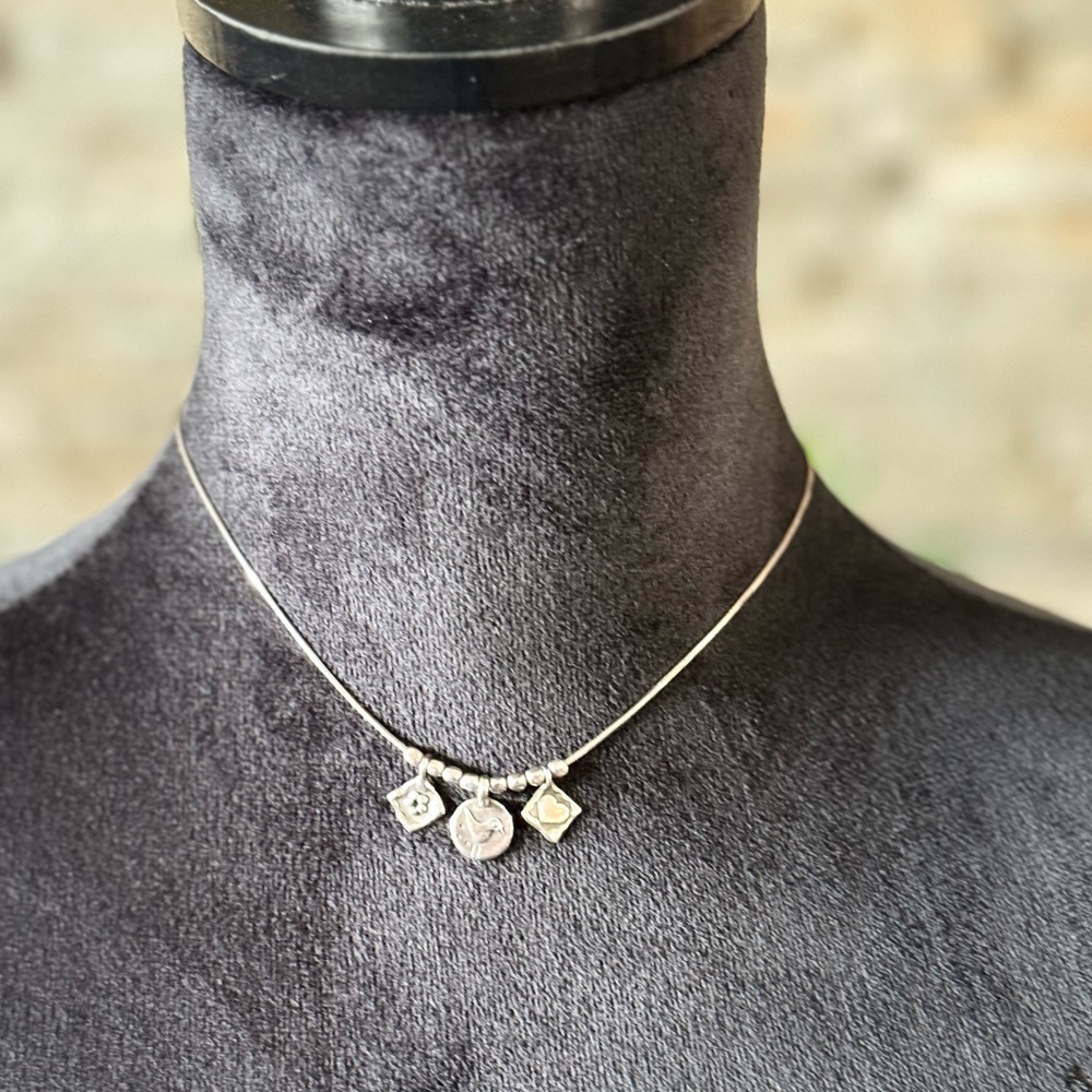 Silpada - Reversible Sterling Silver Heart, Bird, Flower Necklace